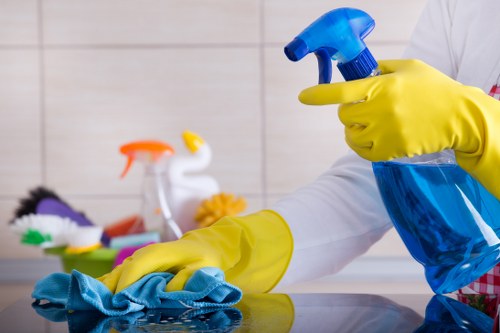 Carpet cleaner preparing equipment with safety checks before work begins