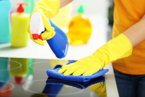 Deep cleaning a modern sofa with specialized equipment